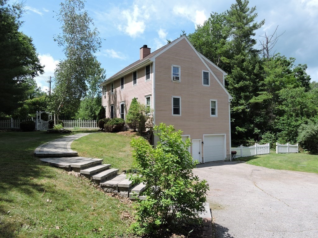 120 North Sturbridge Road Charlton, MA 01507 - Photo 39 of 39 a view of backyard with garden and trees