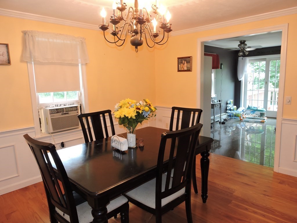120 North Sturbridge Road Charlton, MA 01507 - Photo 4 of 39 a view of a dining room with furniture window and wooden floor