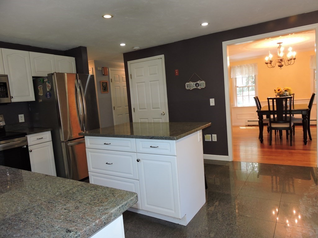 120 North Sturbridge Road Charlton, MA 01507 - Photo 7 of 39 a kitchen with stainless steel appliances granite countertop a refrigerator and a stove top oven