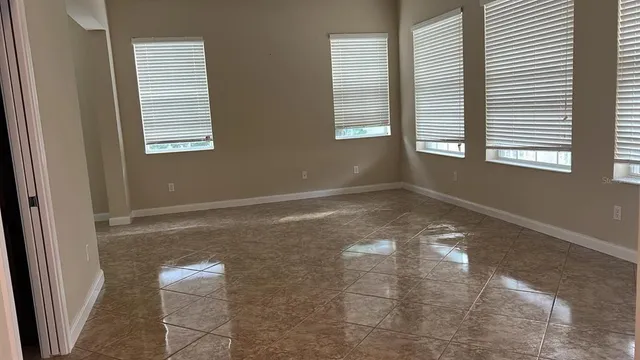 an empty room with windows