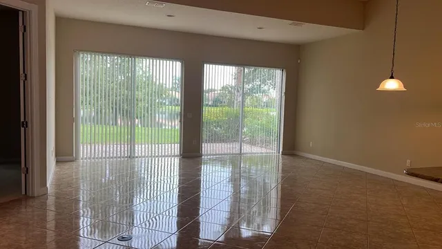 a view of a room and window