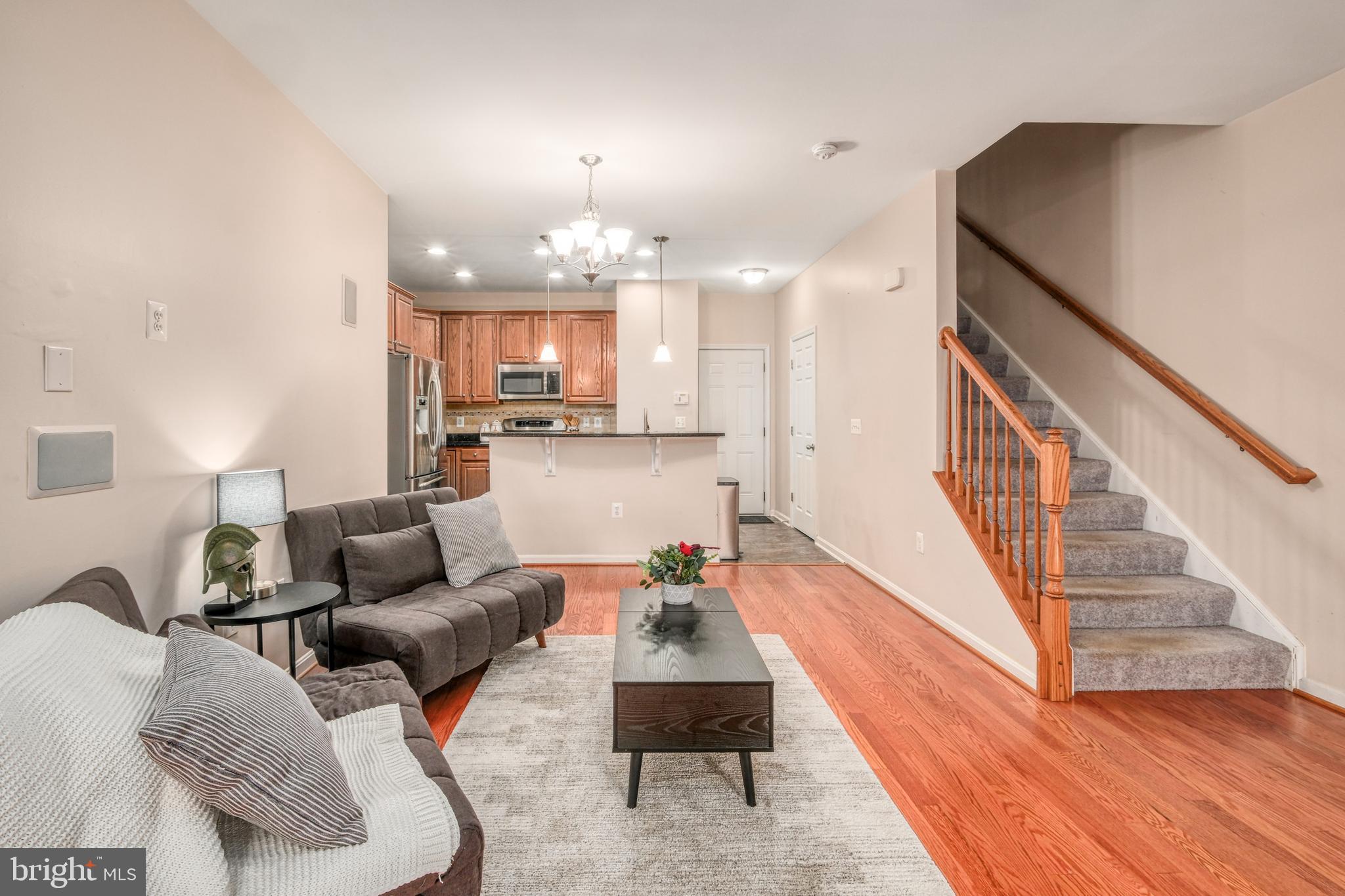 9583 Center Street Manassas, VA 20110 - Photo 10 of 34 LR looking towards kitchen, stairs to UL