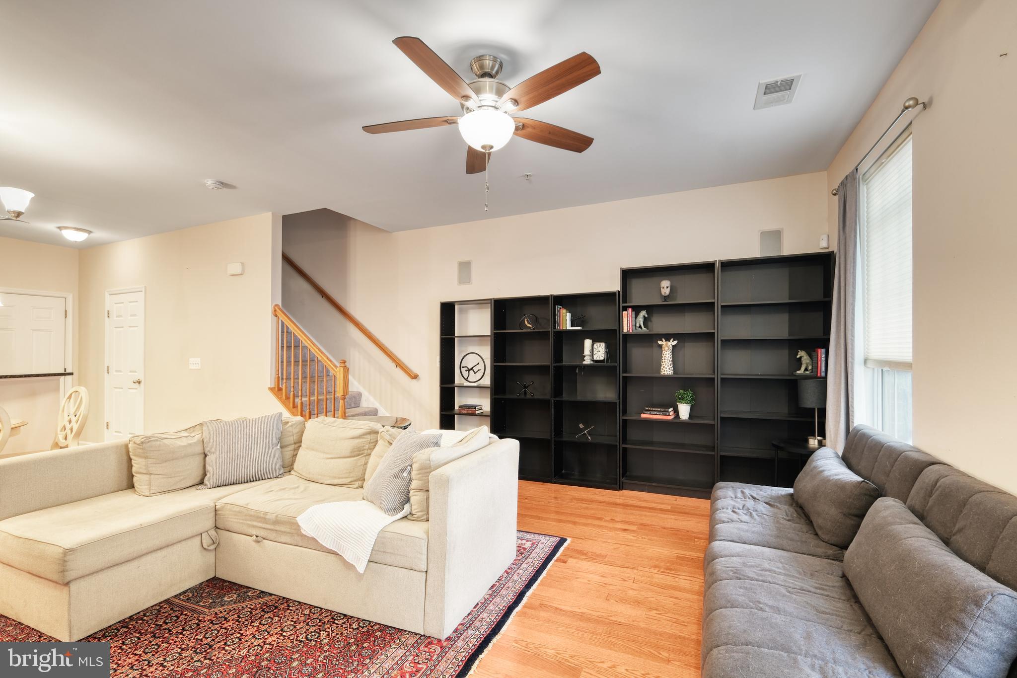 9583 Center Street Manassas, VA 20110 - Photo 11 of 34 Living room w/hardwood floors, ceiling fan