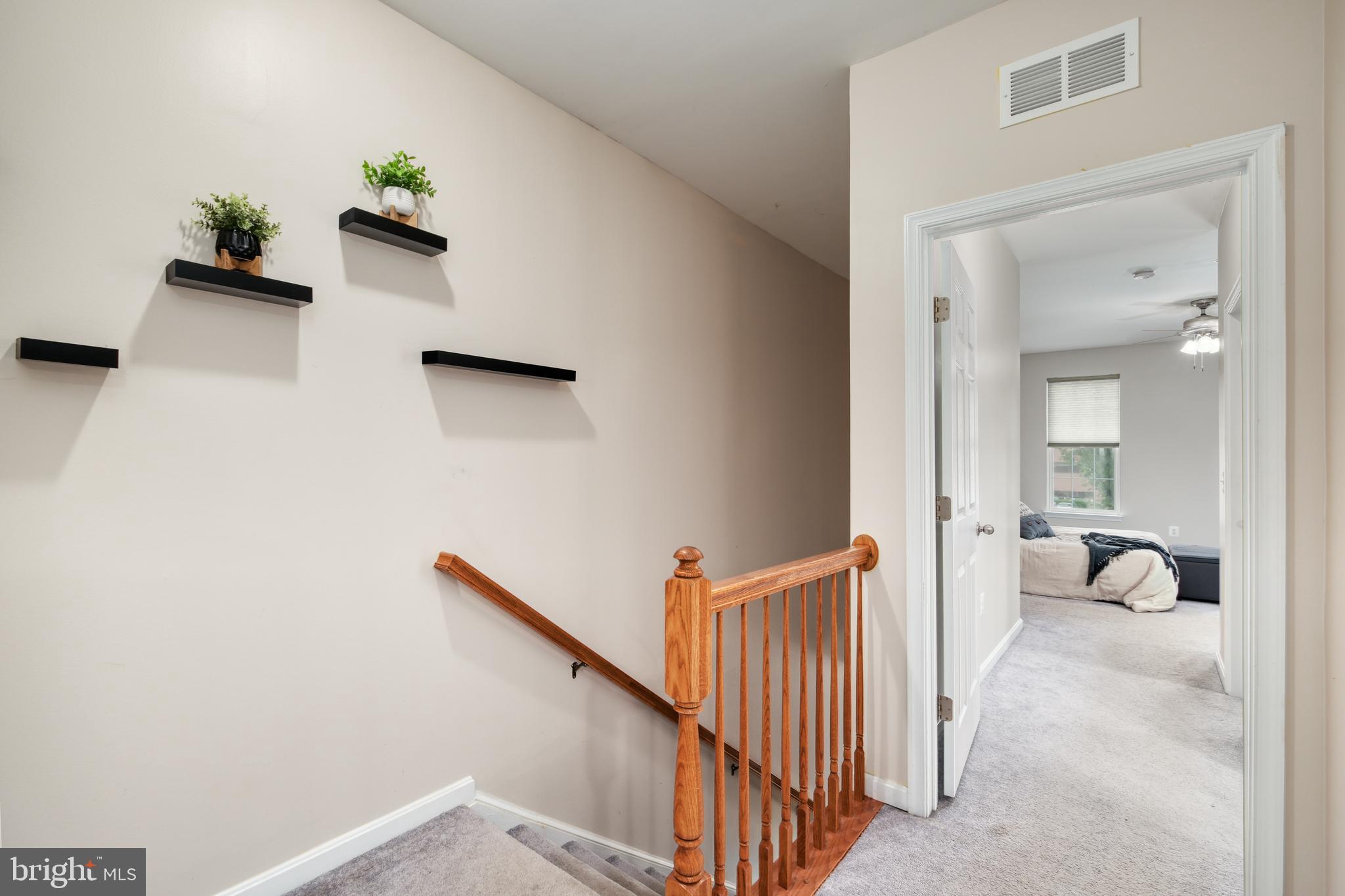 9583 Center Street Manassas, VA 20110 - Photo 20 of 34 Upper level hall has laundry, HVAC & linen closets