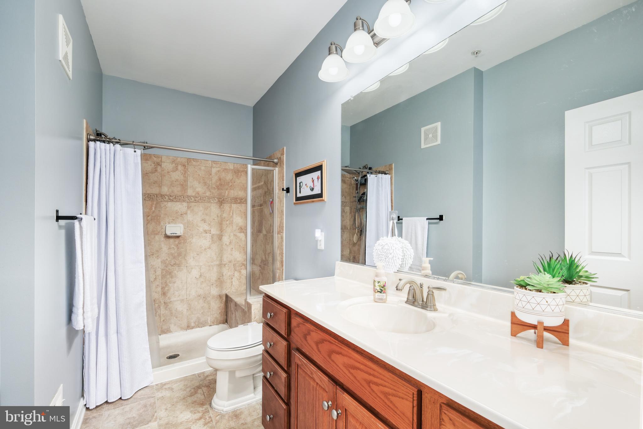 9583 Center Street Manassas, VA 20110 - Photo 24 of 34 Private bath w/walk-in shower in primary BR suite