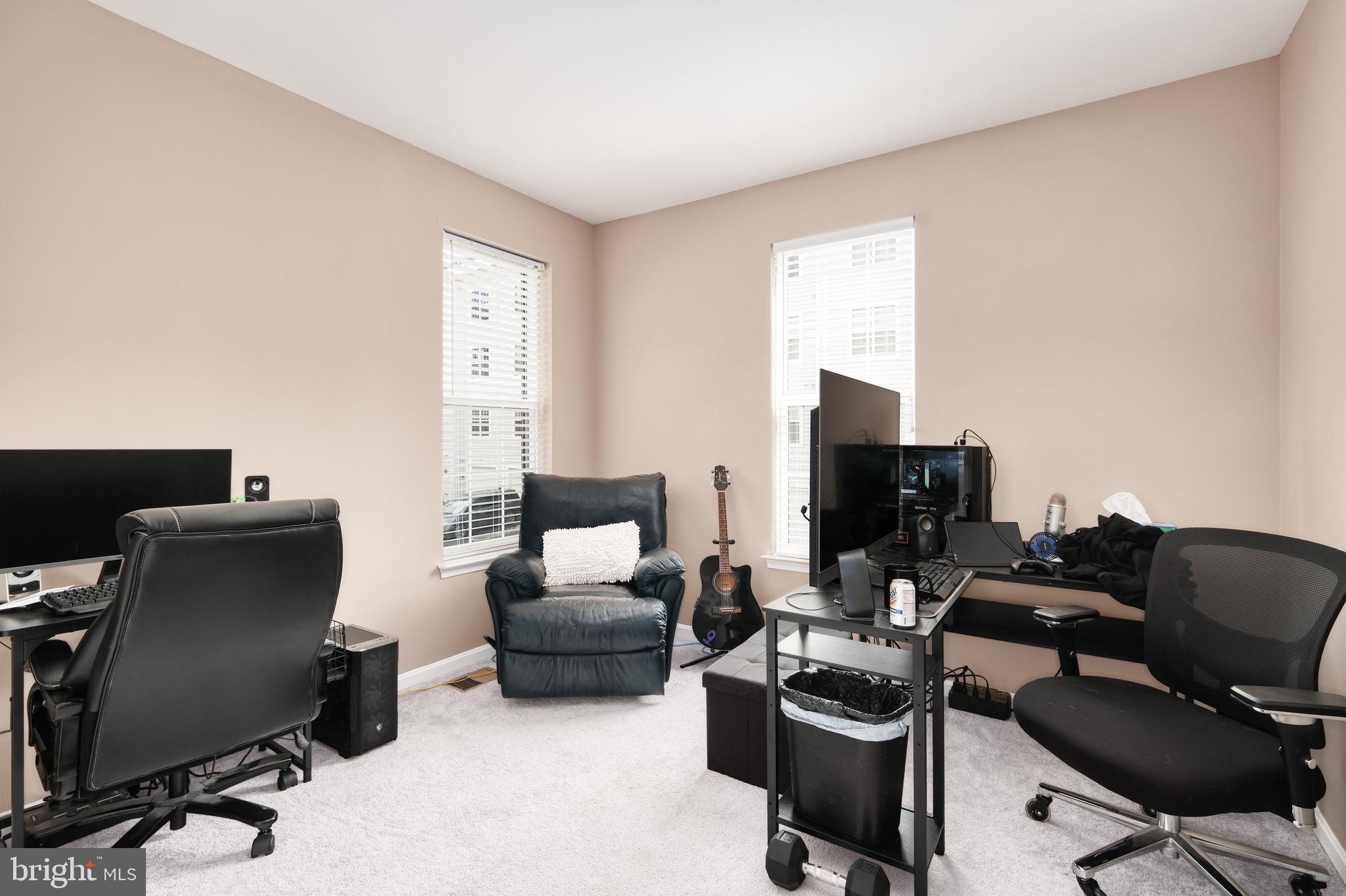 9583 Center Street Manassas, VA 20110 - Photo 26 of 34 Bedroom 2 has carpet, big windows