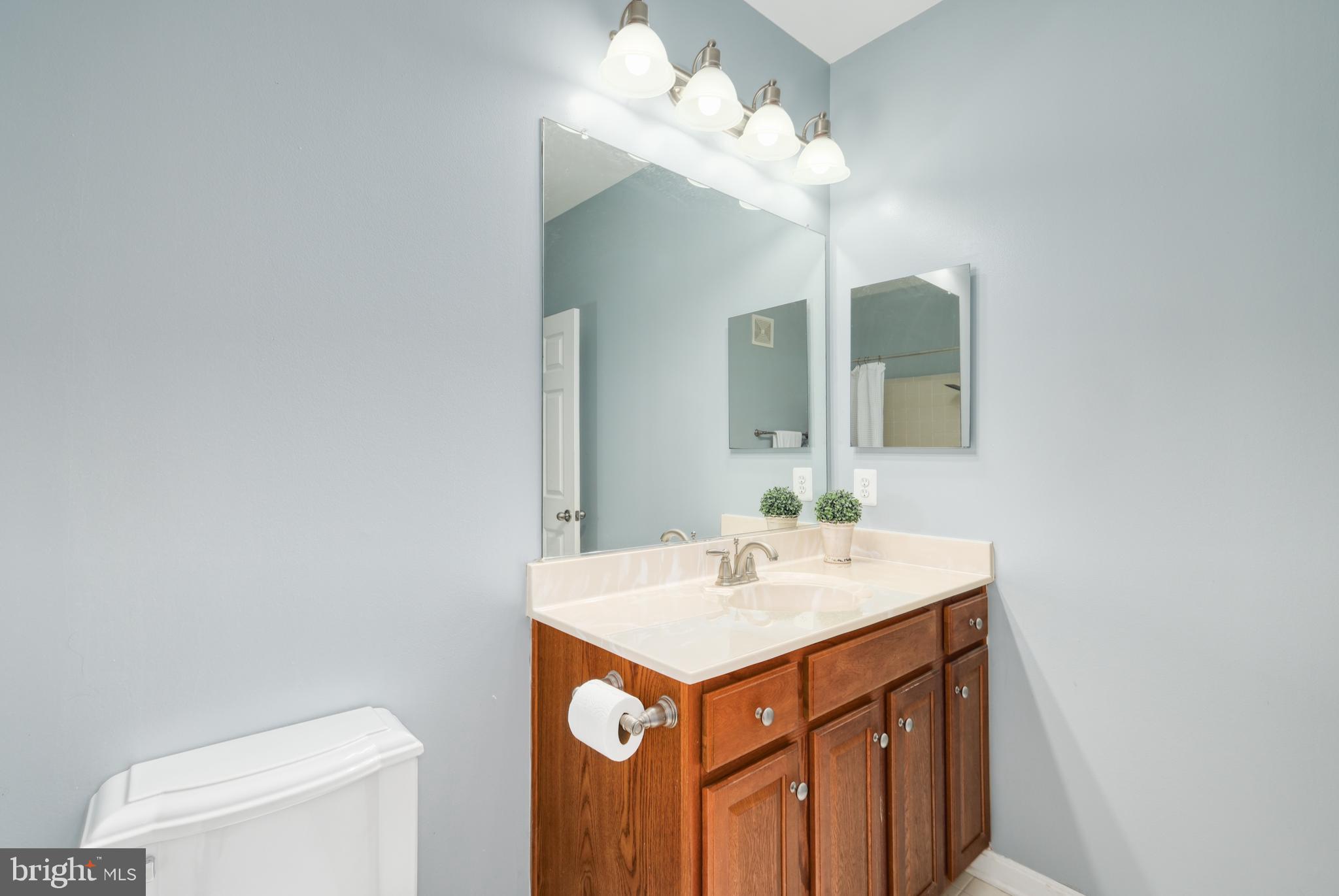 9583 Center Street Manassas, VA 20110 - Photo 31 of 34 Upper level full hall bathroom