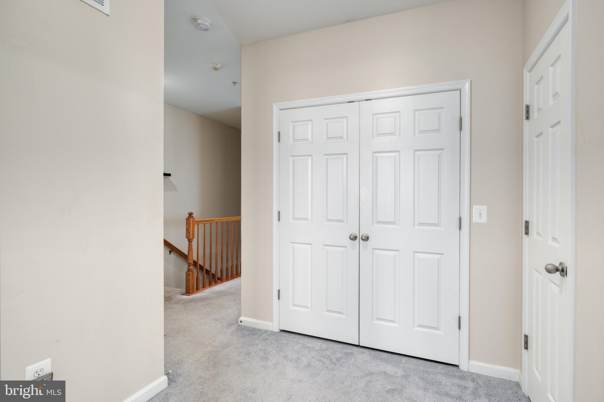9583 Center Street Manassas, VA 20110 - Photo 33 of 34 HVAC and HWH in utility closet in upper hallway