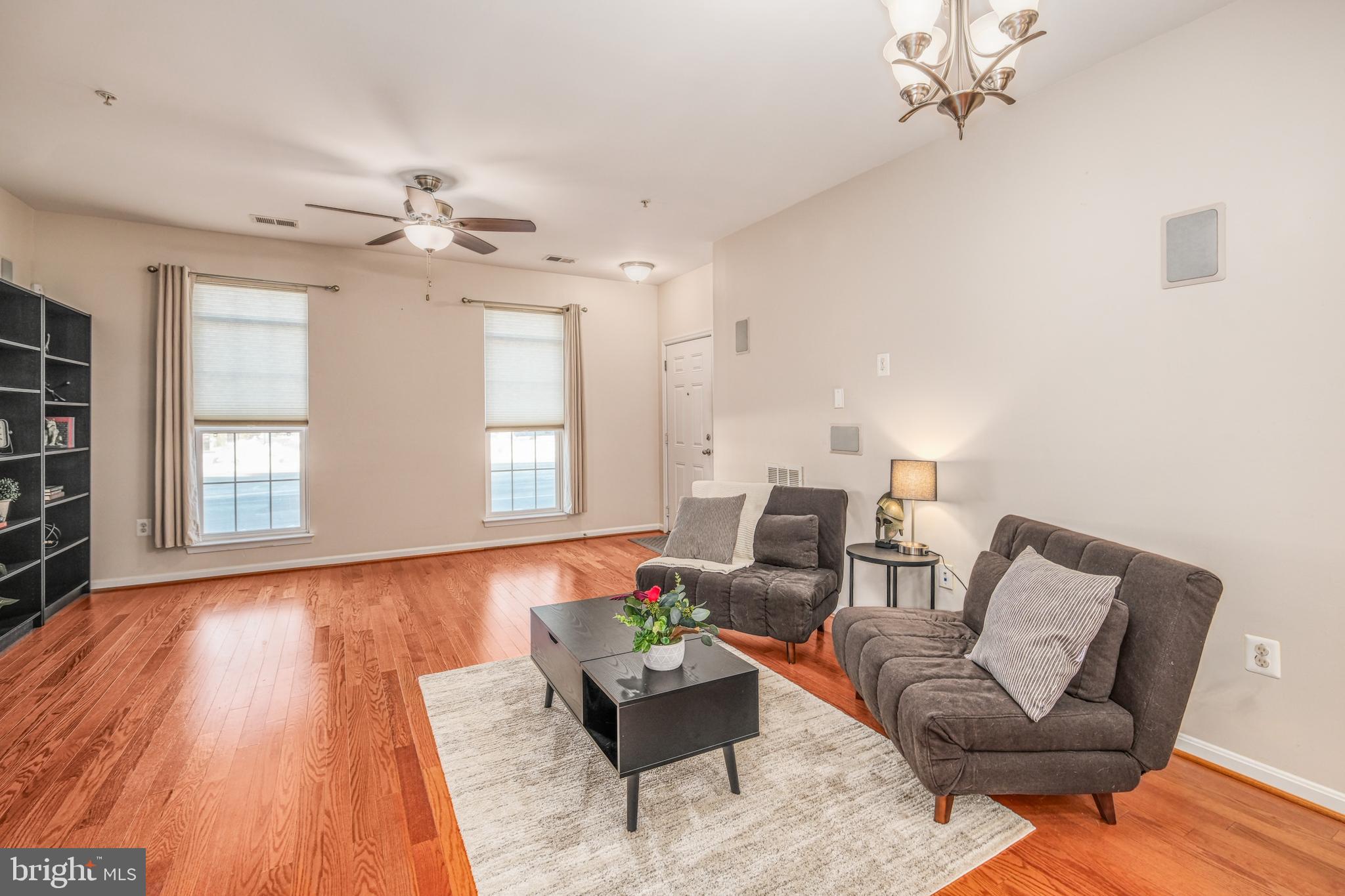 9583 Center Street Manassas, VA 20110 - Photo 7 of 34 Living room with 9' ceilings and ceiling fan