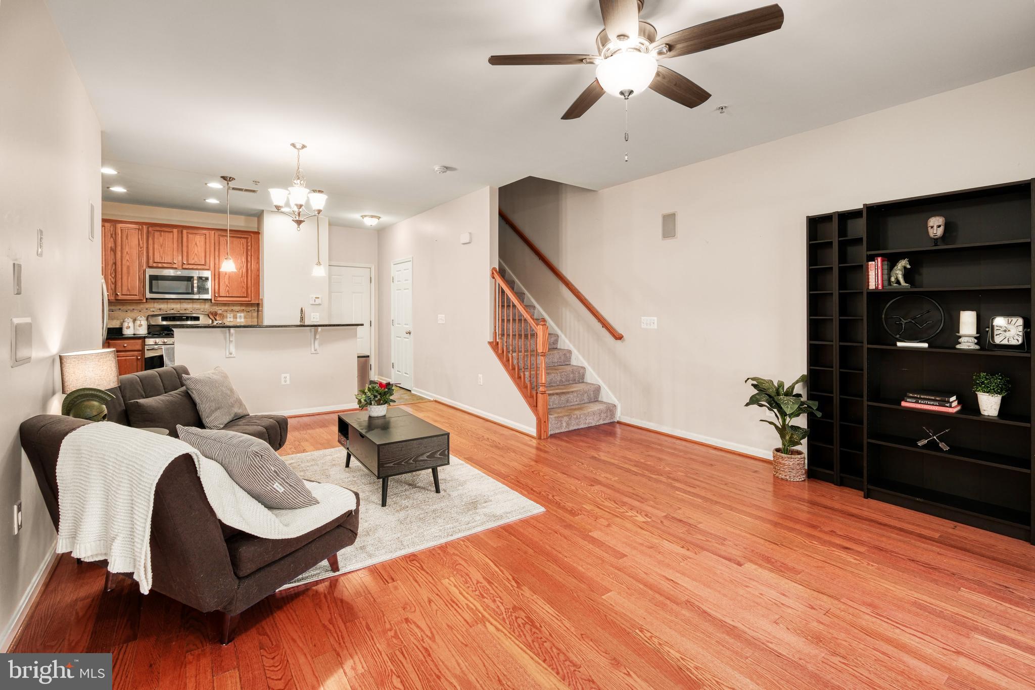 9583 Center Street Manassas, VA 20110 - Photo 8 of 34 Hardwood floors in LR, dining area and Kitchen