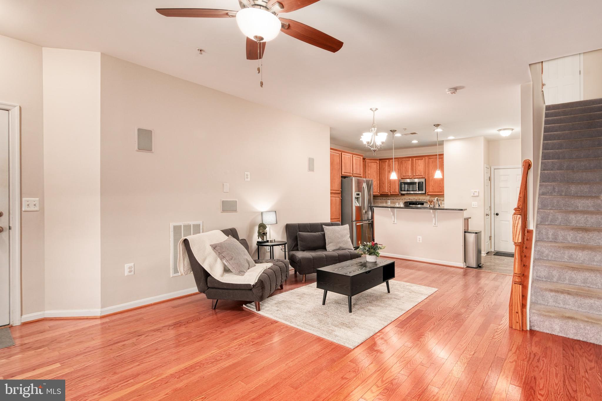 9583 Center Street Manassas, VA 20110 - Photo 9 of 34 Open flow in these main level spaces!