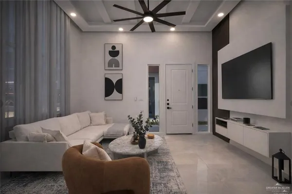 a living room with furniture and a flat screen tv