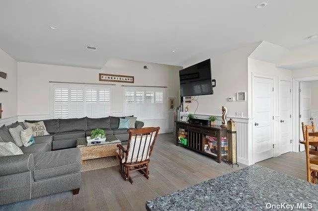 a view of a patio with a table and chairs