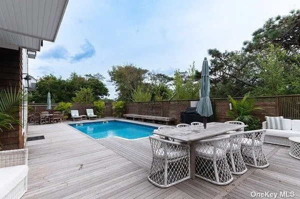 a view of a dinning tables and chairs in the patio