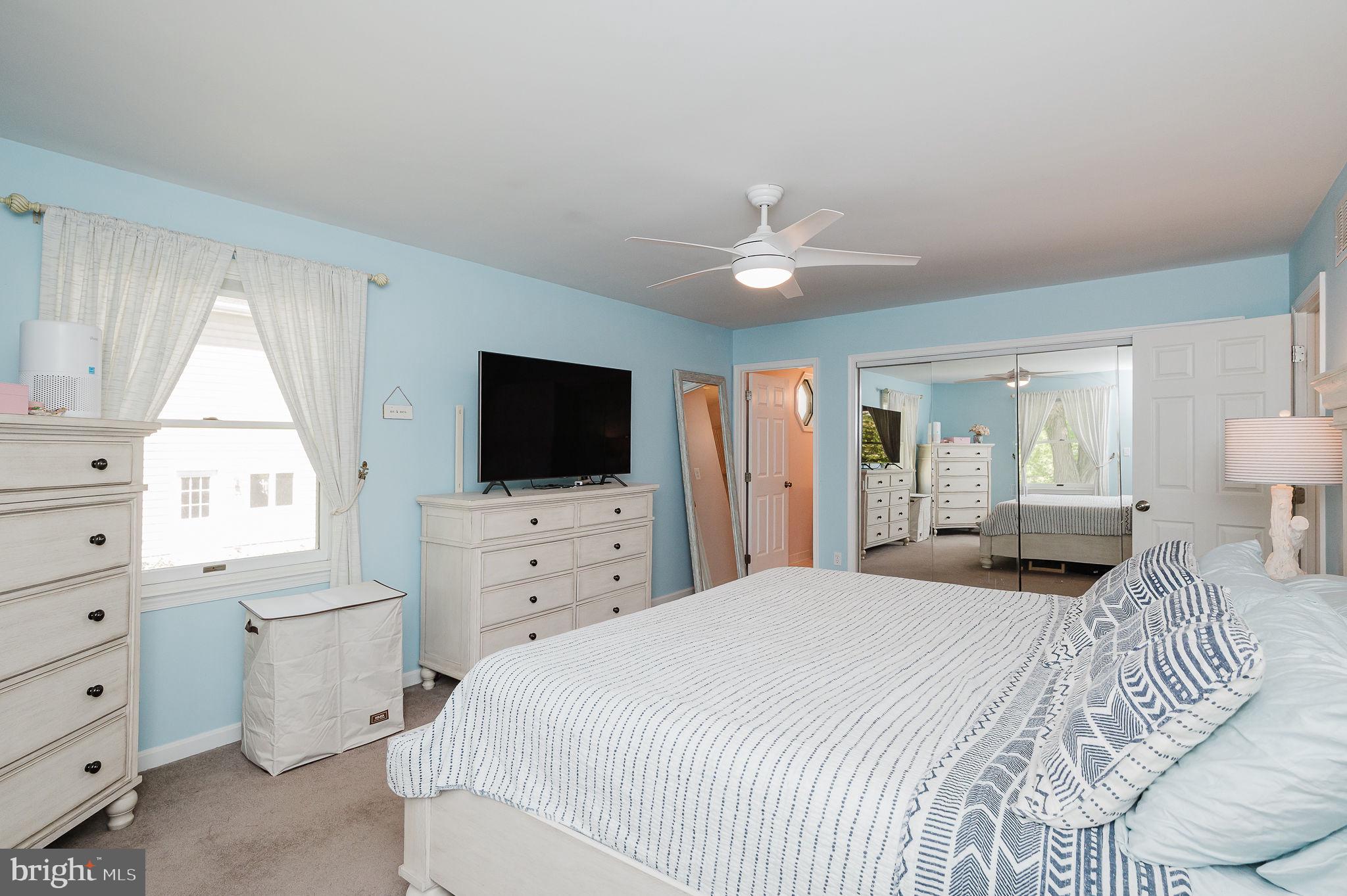 2222 Monocacy Road Essex, MD 21221 - Photo 20 of 70 Serene blue bedroom with modern charm.
