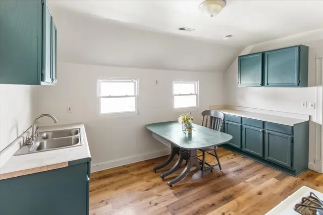 a workspace with furniture and window