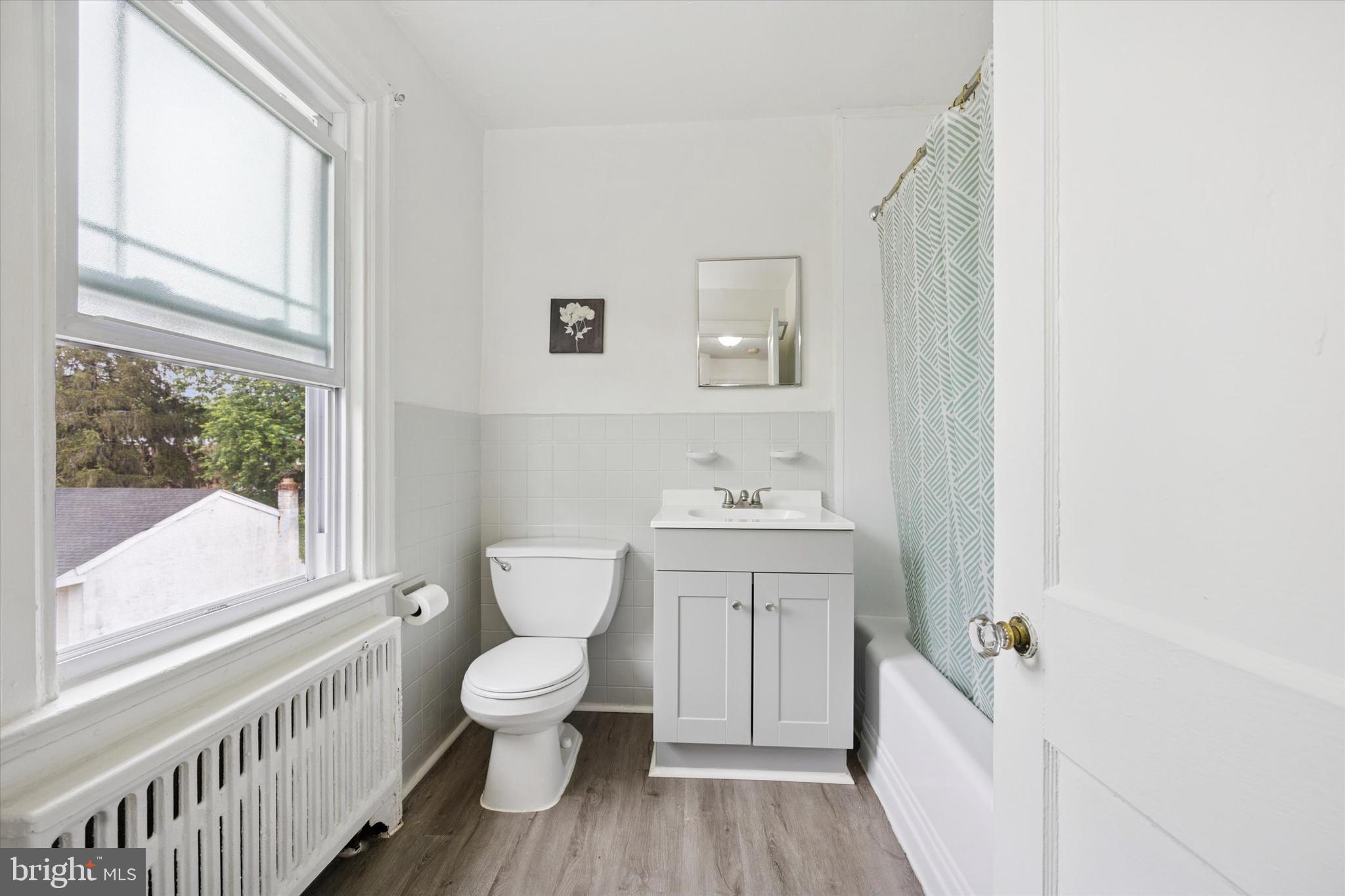 237 East Roland Road Brookhaven, PA 19015 - Photo 21 of 35 Updated full bathroom with new vanity and floor