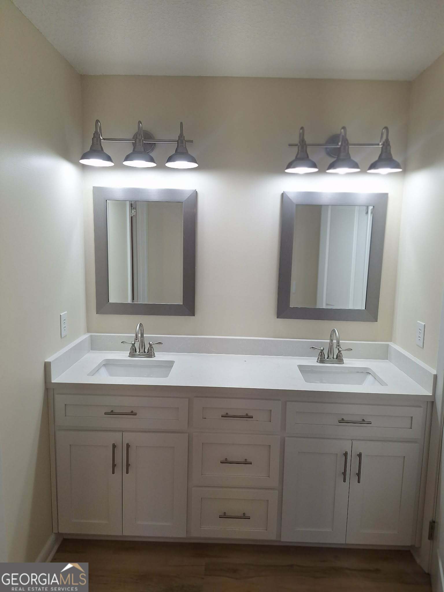 249 Satilla Church Road Baxley, GA 31513 - Photo 16 of 26 a bathroom with a sink and a mirror