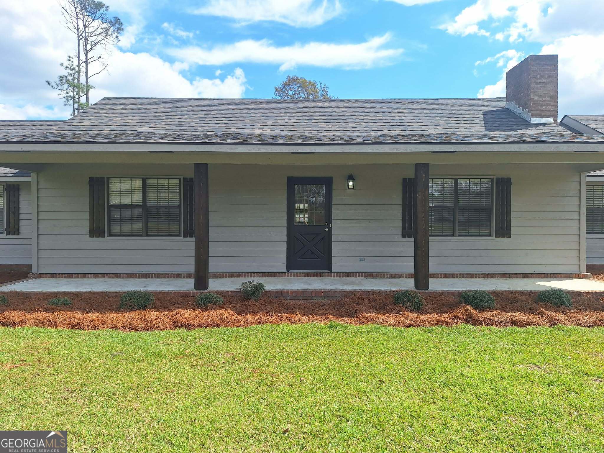 249 Satilla Church Road Baxley, GA 31513 - Photo 22 of 26 a view of a house with a swimming pool