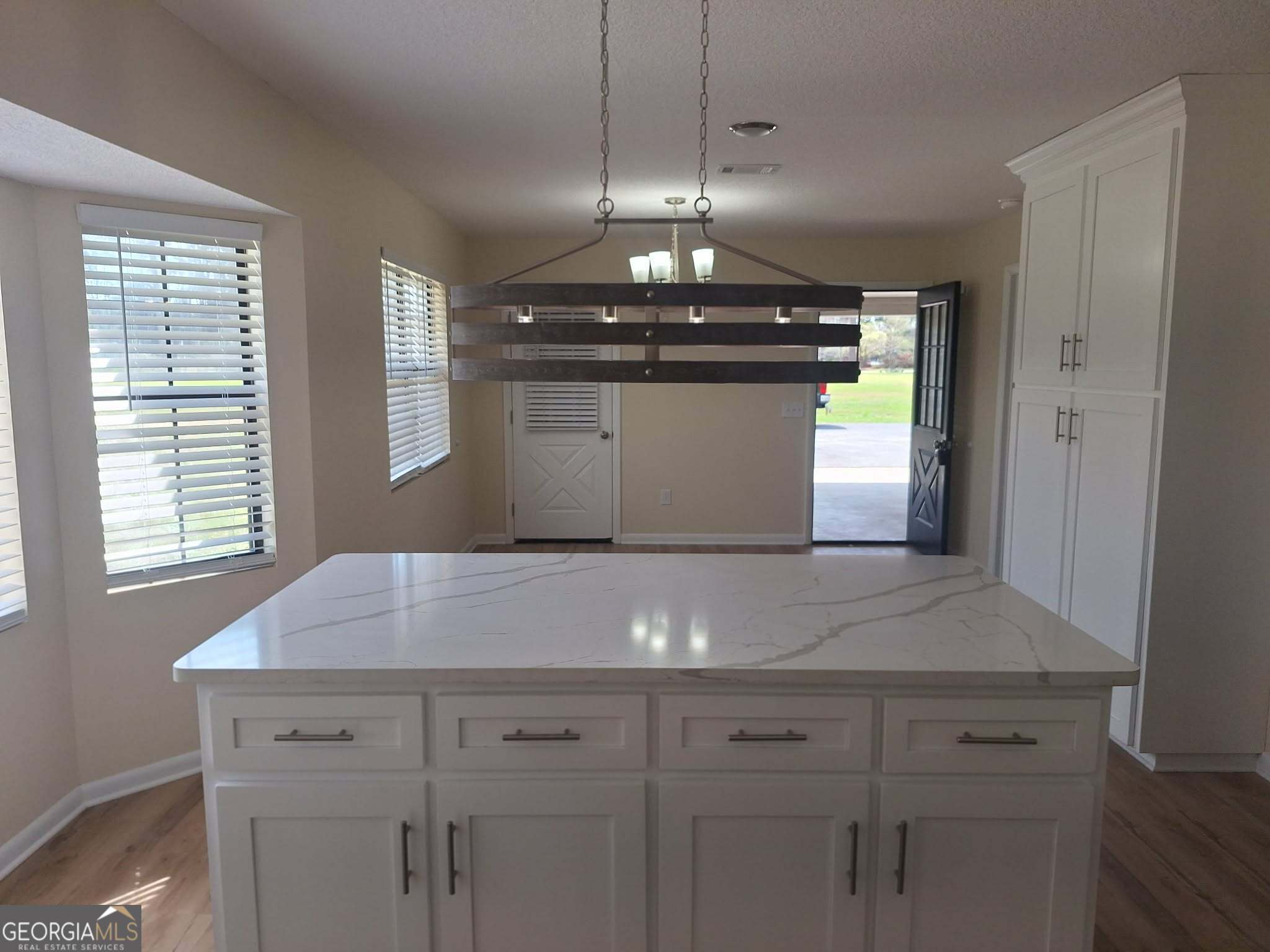 249 Satilla Church Road Baxley, GA 31513 - Photo 5 of 26 a view of cabinets and window