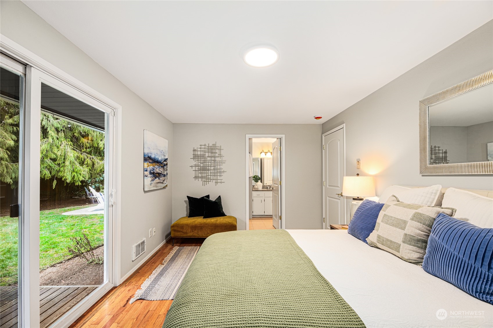10810 9th Drive Southeast Everett, WA 98208 - Photo 11 of 26 a bedroom with a bed and wooden floor