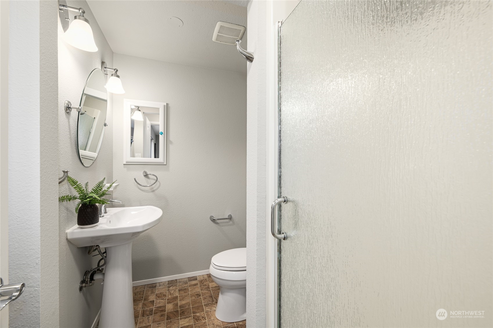 10810 9th Drive Southeast Everett, WA 98208 - Photo 17 of 26 a bathroom with a toilet sink and shower