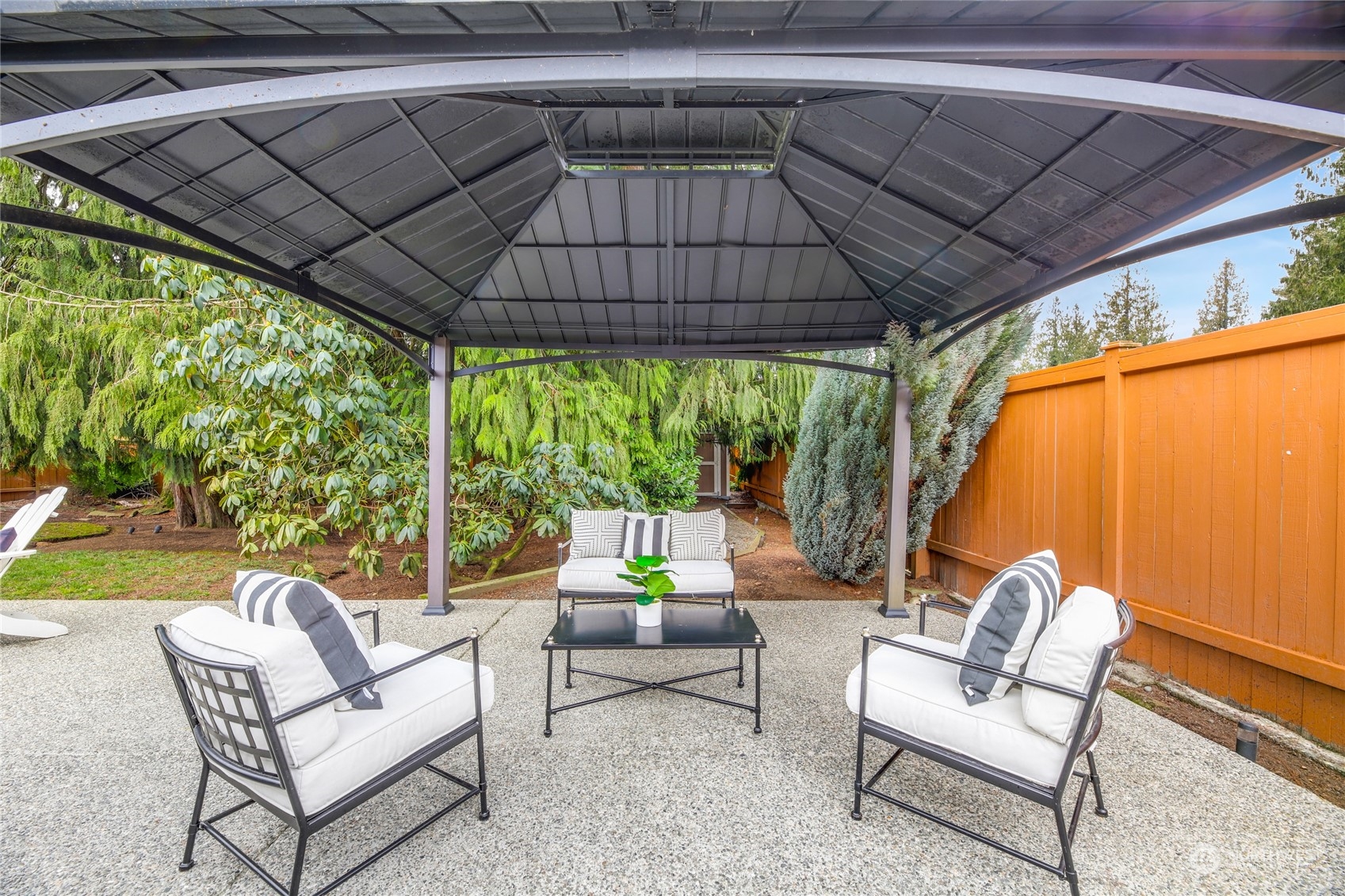 10810 9th Drive Southeast Everett, WA 98208 - Photo 18 of 26 a patio with a patio table and chairs
