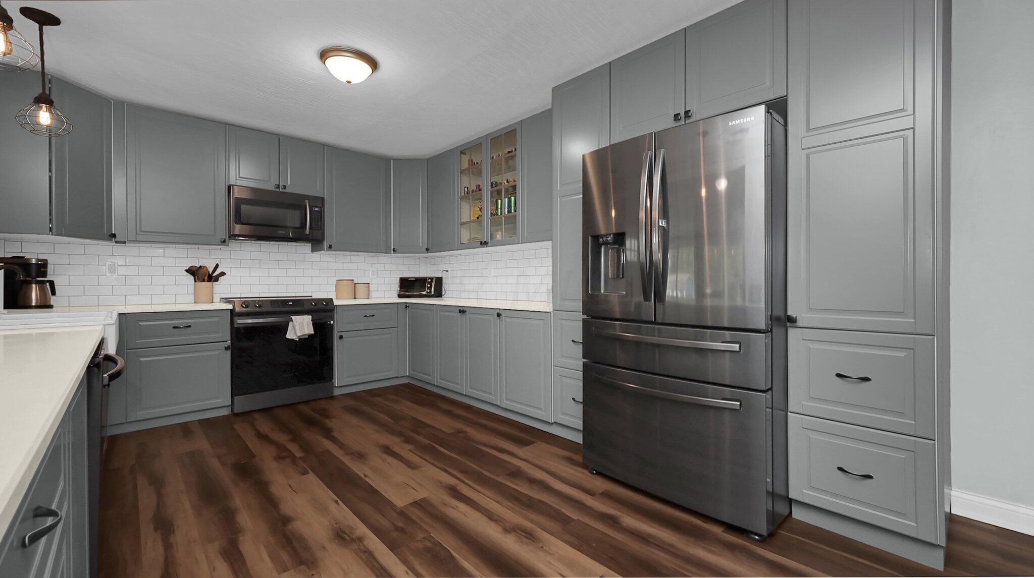 7790 Schott Road Westerville, OH 43081 - Photo 12 of 50 With cabinets galore and updated stainless steal appliances, you'll have no problem feeding a hungry crowd! Quart counters, custom backsplash, farmhouse sink, and so much more!