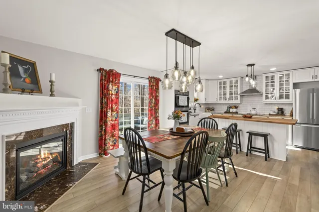 a view of fireplace with wooden floor