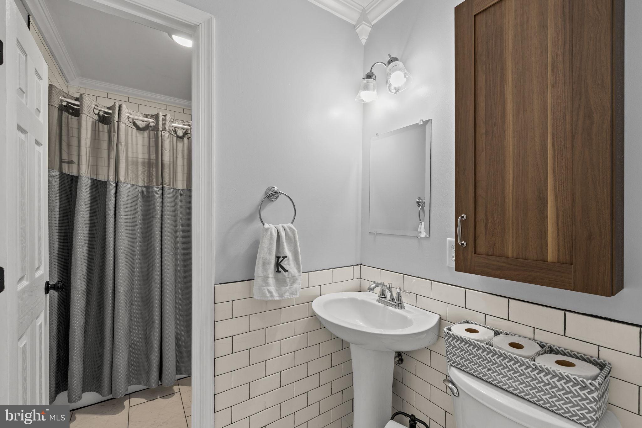 6463 Wheeler Drive King George, VA 22485 - Photo 27 of 57 a bathroom with a sink and a mirror