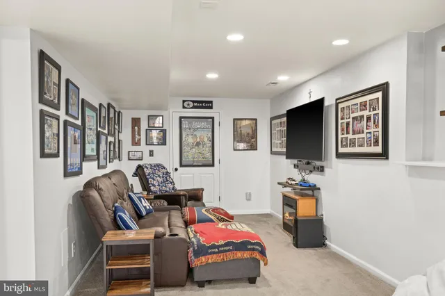 a view of a patio with couches and potted plant