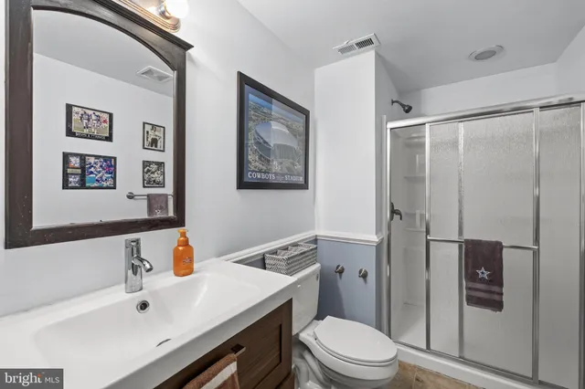 a view of a patio with table and chairs and potted plants