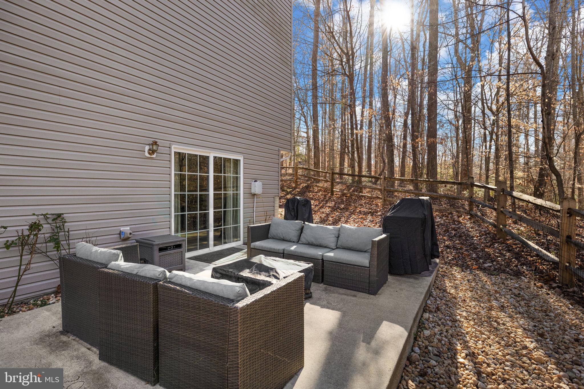 6463 Wheeler Drive King George, VA 22485 - Photo 38 of 57 a view of a patio with couches and potted plant