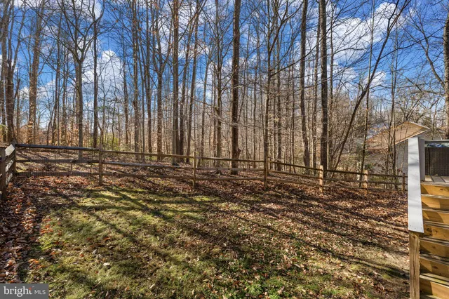 a view of a backyard of the house