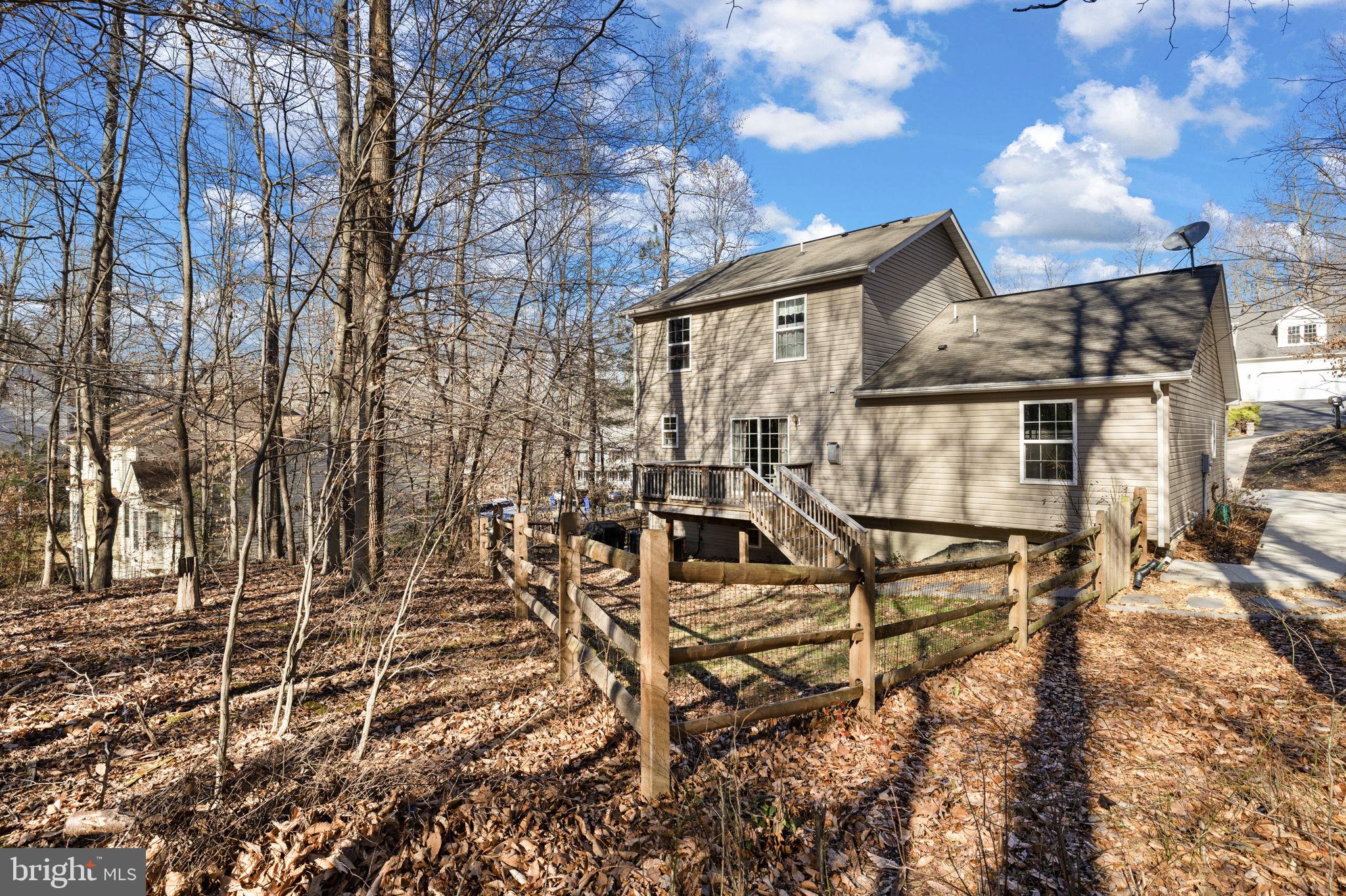 6463 Wheeler Drive King George, VA 22485 - Photo 43 of 57 a view of a house with backyard and sitting area
