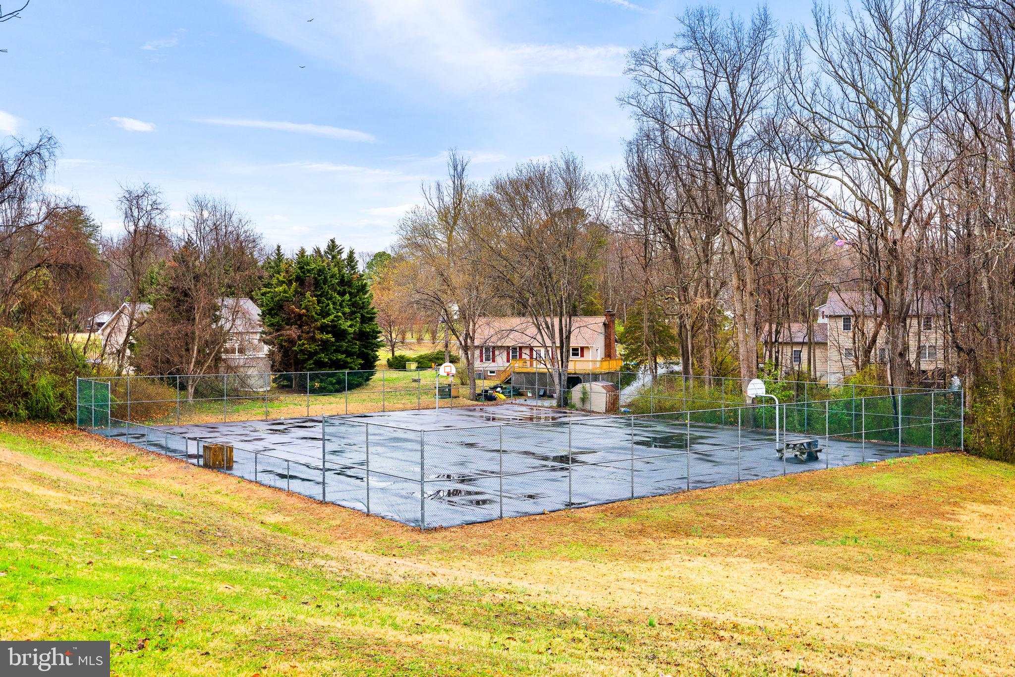 6463 Wheeler Drive King George, VA 22485 - Photo 46 of 57 a view of a swimming pool with an outdoor space and seating area