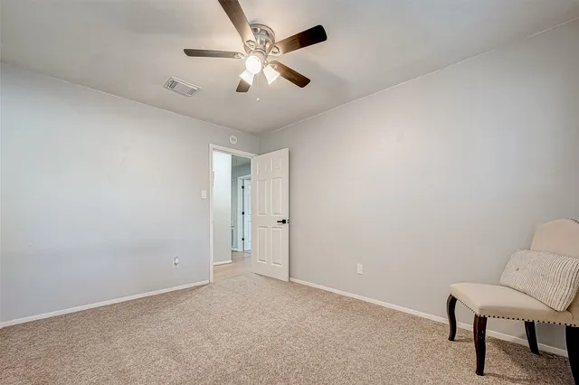 an empty room with a workspace