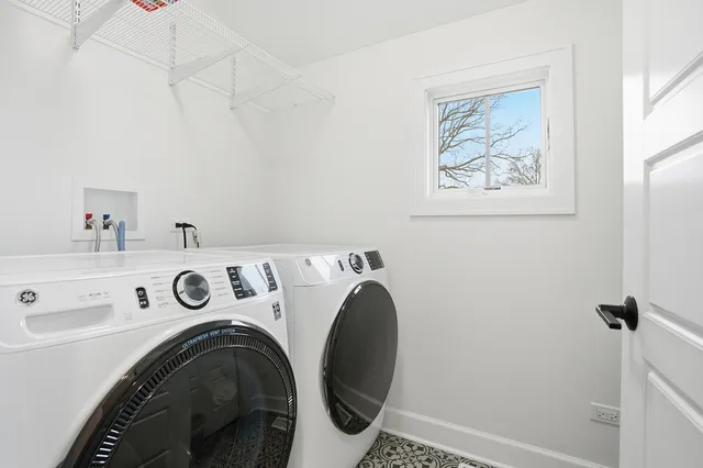 a utility room with dryer and washer