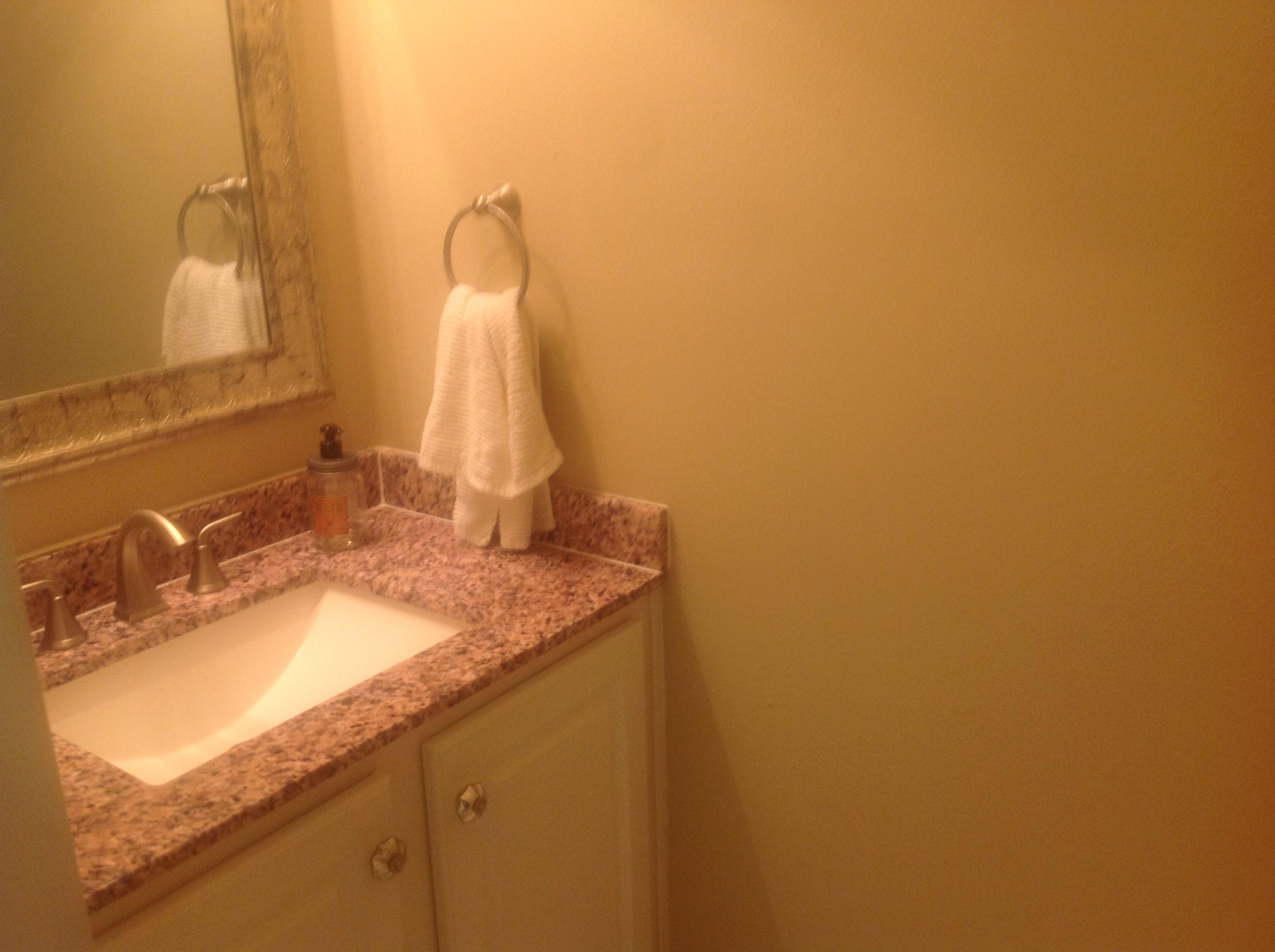 504 Keystone Road Mary Esther, FL 32569 - Photo 12 of 17 a bathroom with a granite countertop sink and a mirror