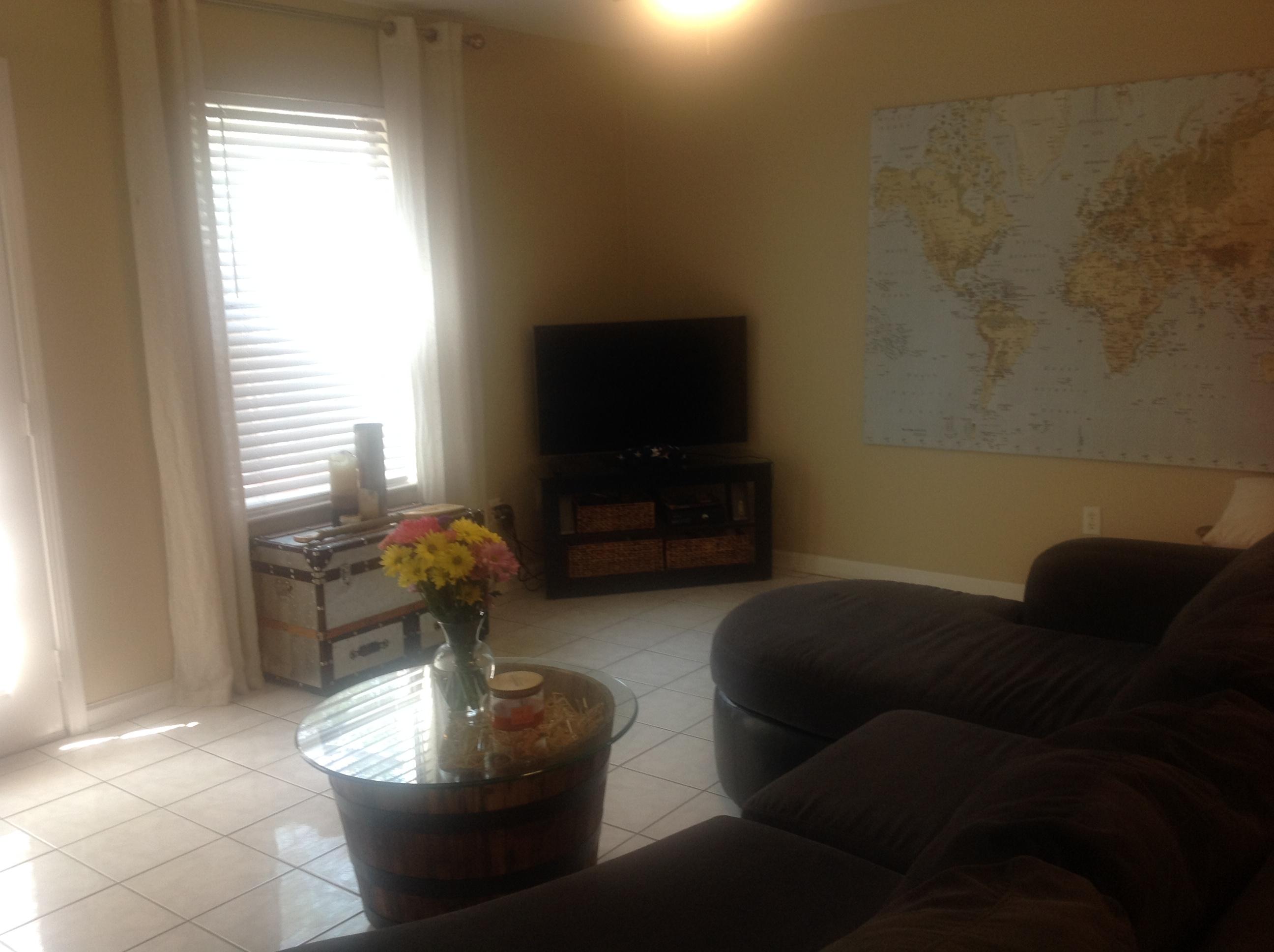 504 Keystone Road Mary Esther, FL 32569 - Photo 3 of 17 a living room with furniture and a flat screen tv