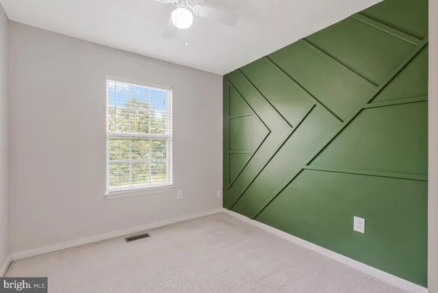 a view of a room that has a window