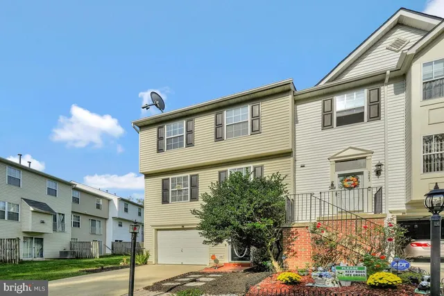 a front view of a building with street view
