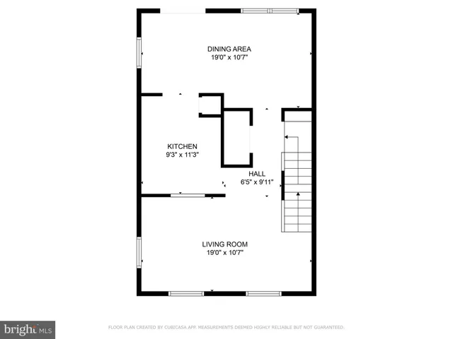 a picture of a bench in front of a window