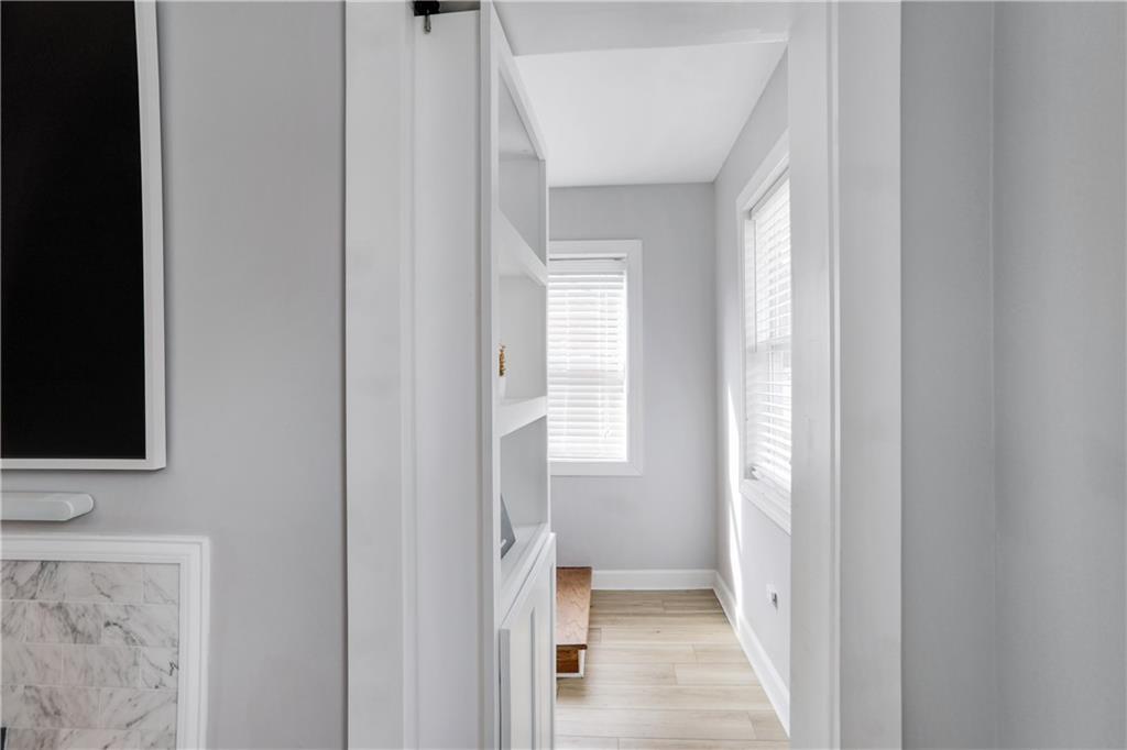 1275 Eastland Road Southeast Atlanta, GA 30316 - Photo 11 of 31 a bathroom with a toilet sink and a mirror