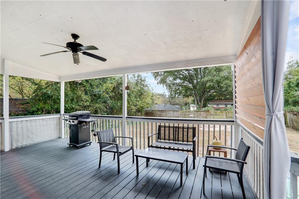 1275 Eastland Road Southeast Atlanta, GA 30316 - Photo 27 of 31 a view of a dining room with furniture window and wooden floor