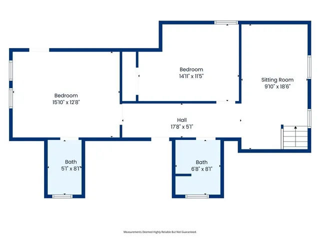 a picture of a bathroom with a white wall