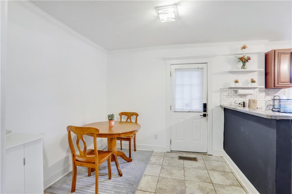 1275 Eastland Road Southeast Atlanta, GA 30316 - Photo 6 of 31 a view of a room with lounge chair and a window