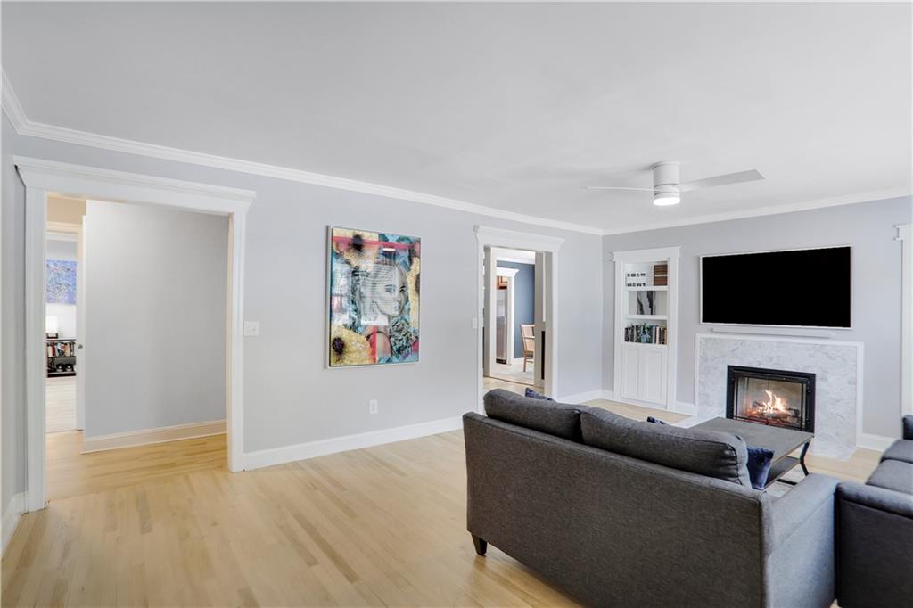 1275 Eastland Road Southeast Atlanta, GA 30316 - Photo 8 of 31 a living room with furniture and a fireplace
