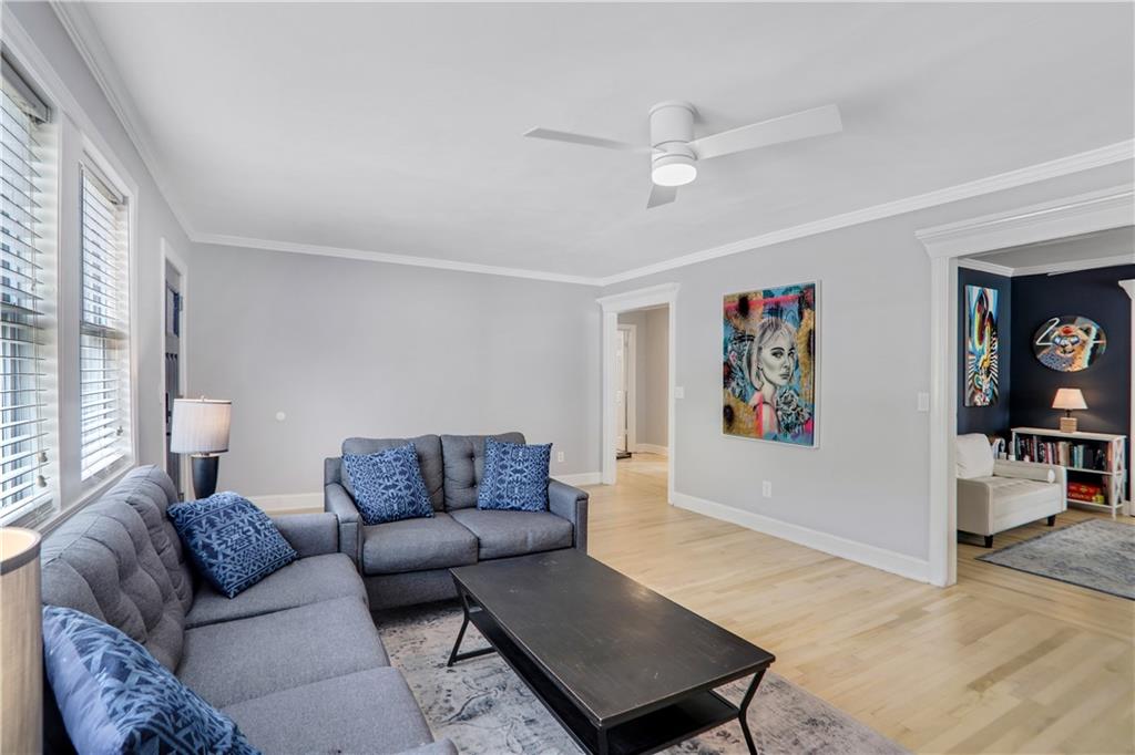 1275 Eastland Road Southeast Atlanta, GA 30316 - Photo 10 of 31 a living room with furniture and a flat screen tv