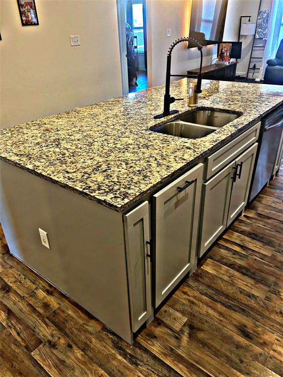 2631 Fish Tank Road Corsicana, TX 75110 - Photo 11 of 40 a kitchen with granite countertop sink and cabinets